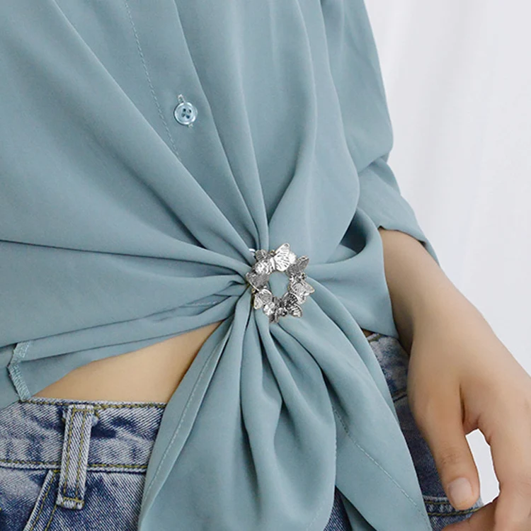 Vlinder sjaalknop broche