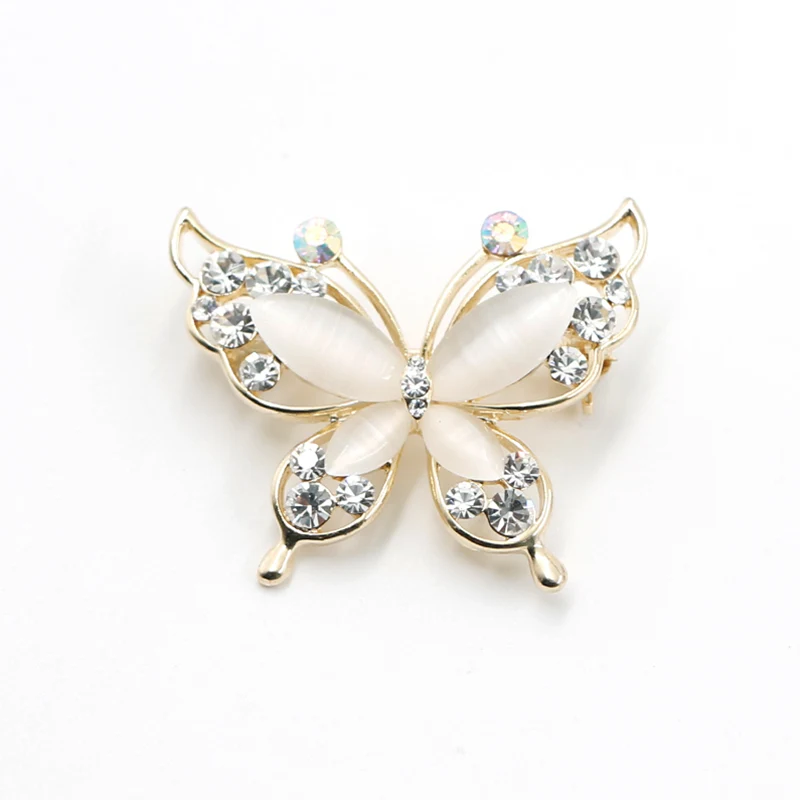 Cateye stenen vlinderbroche met goud vergulde